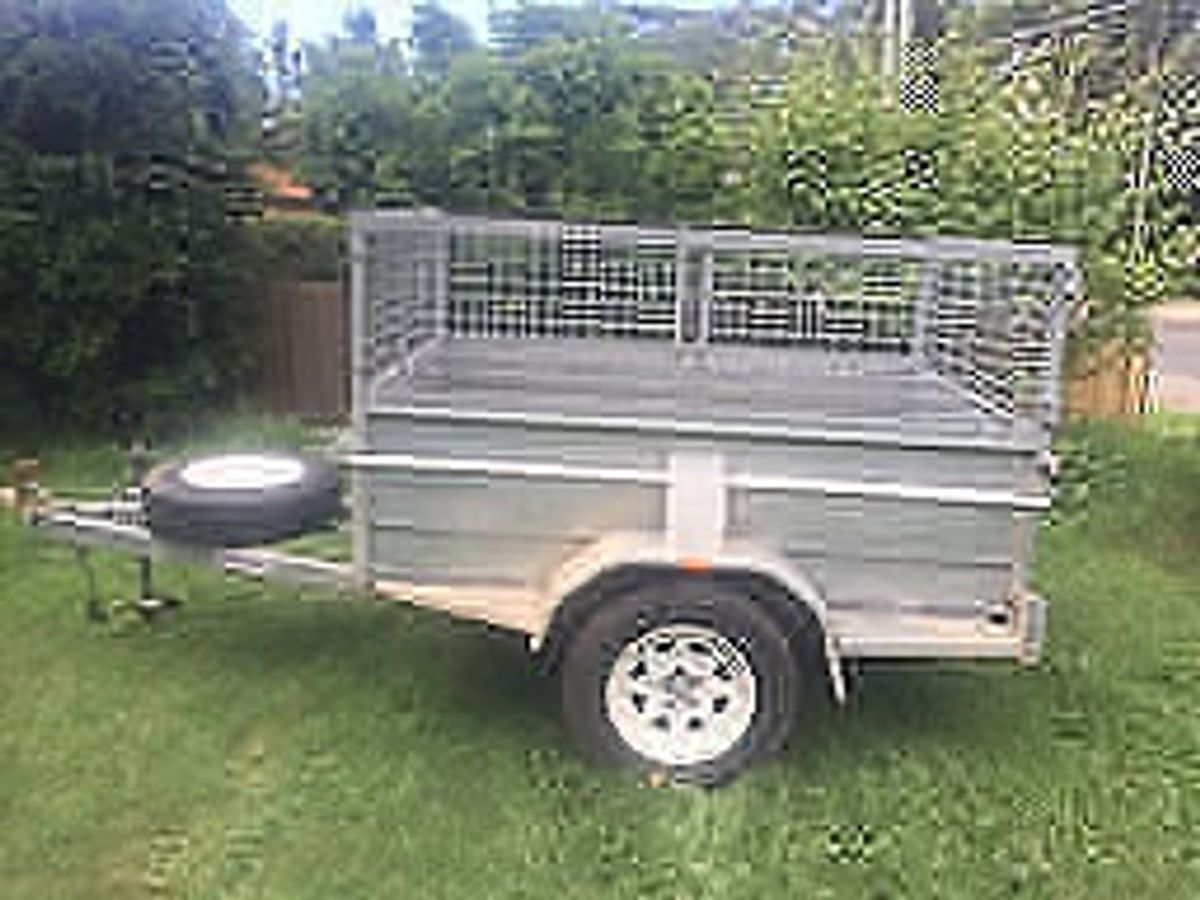 A cage trailer available for hire in North Epping.