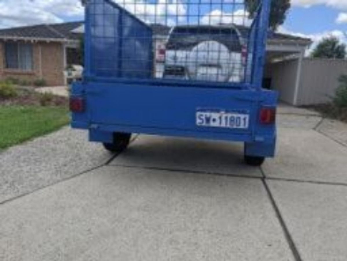 A small cage trailer available for hire in South Guildford.