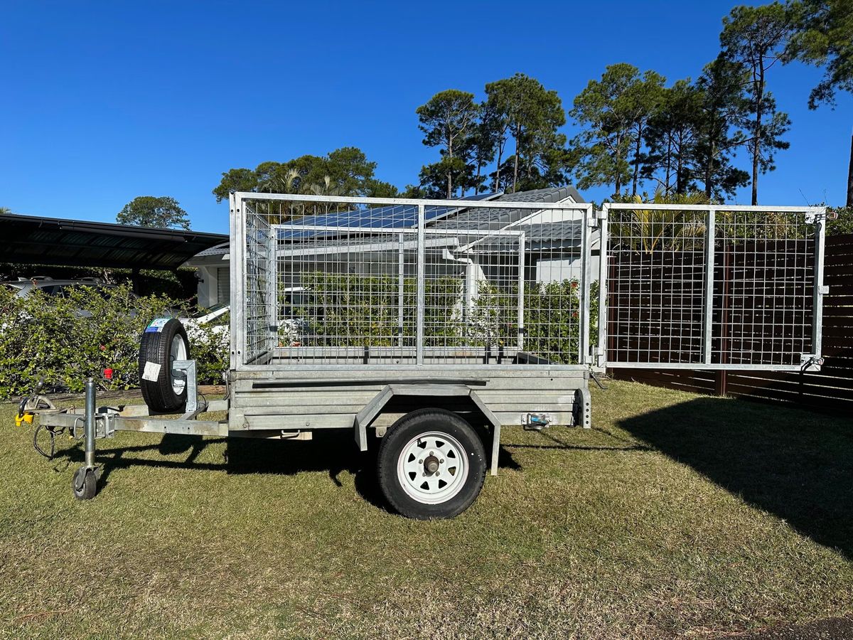 A cage trailer available for hire in North Epping.