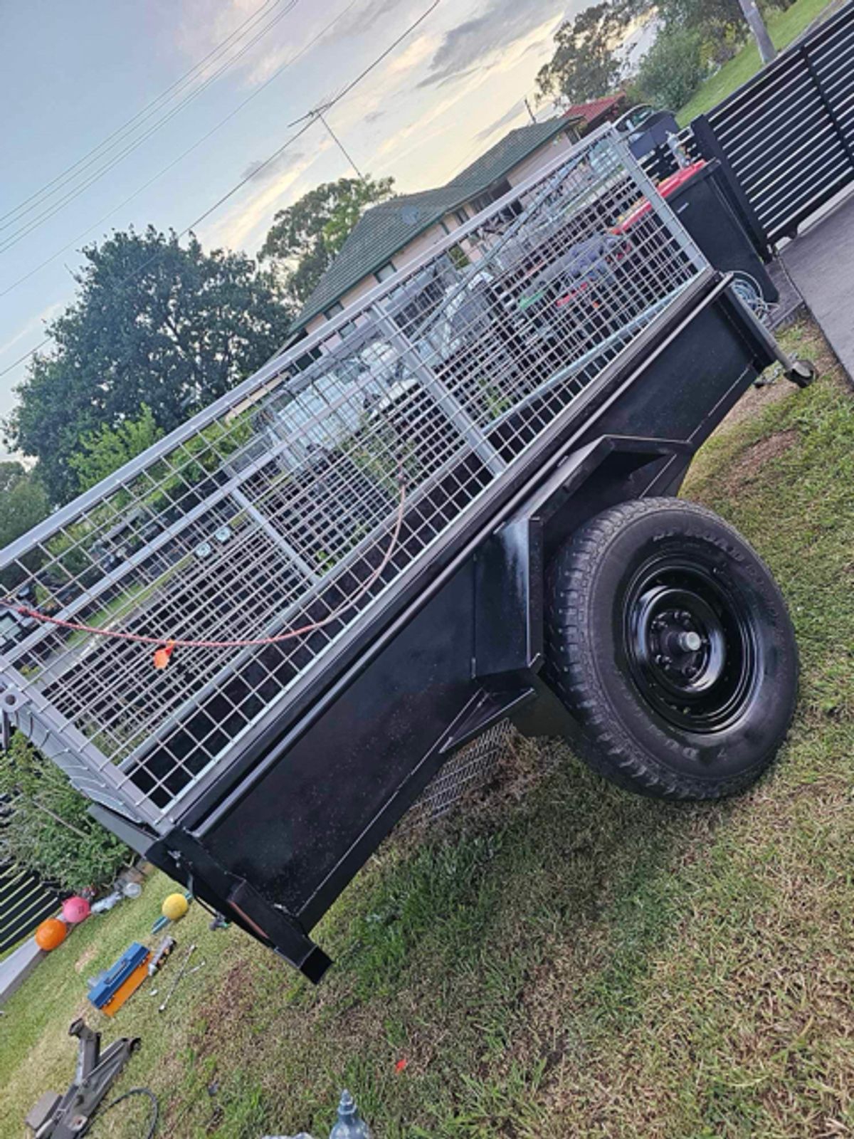 A cage trailer available for hire in Ryde.